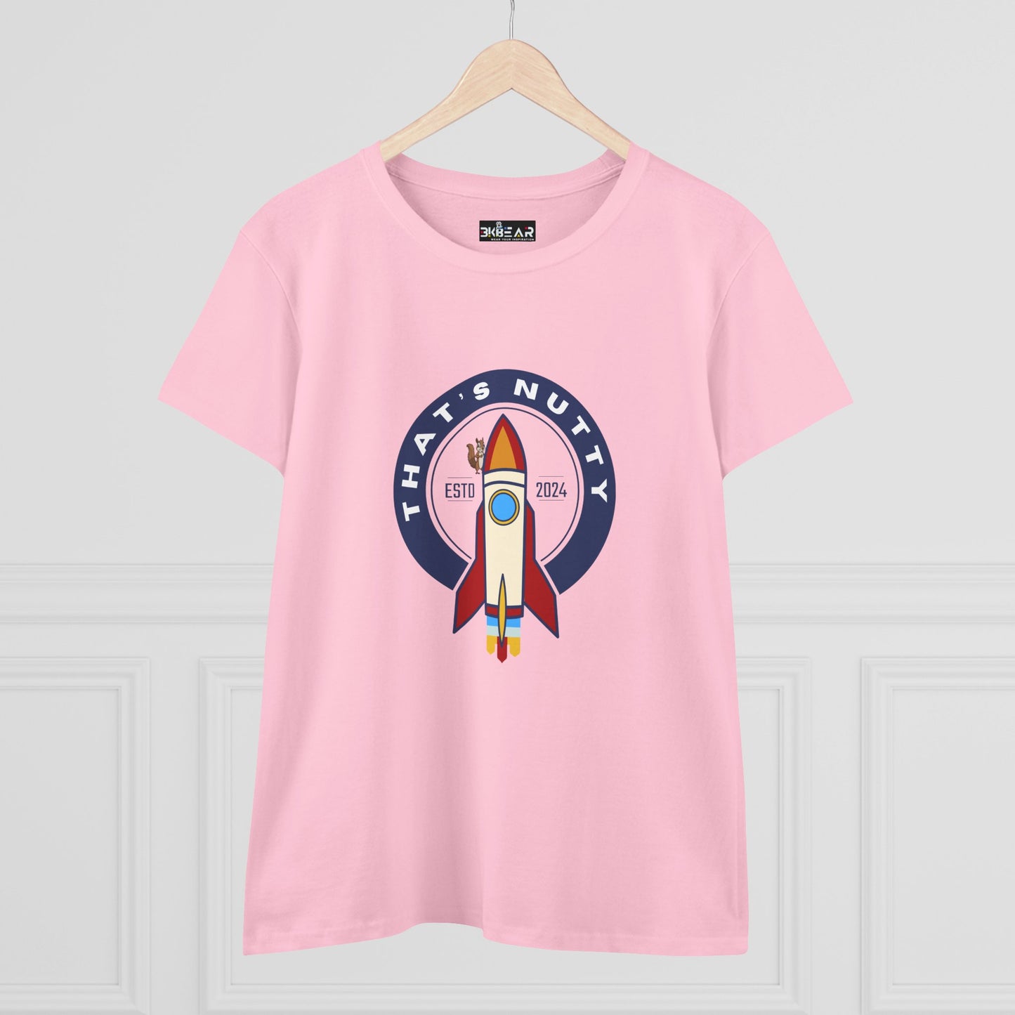 Pink Printify t-shirt featuring a funny space graphic shirt design with a rocket and text on front