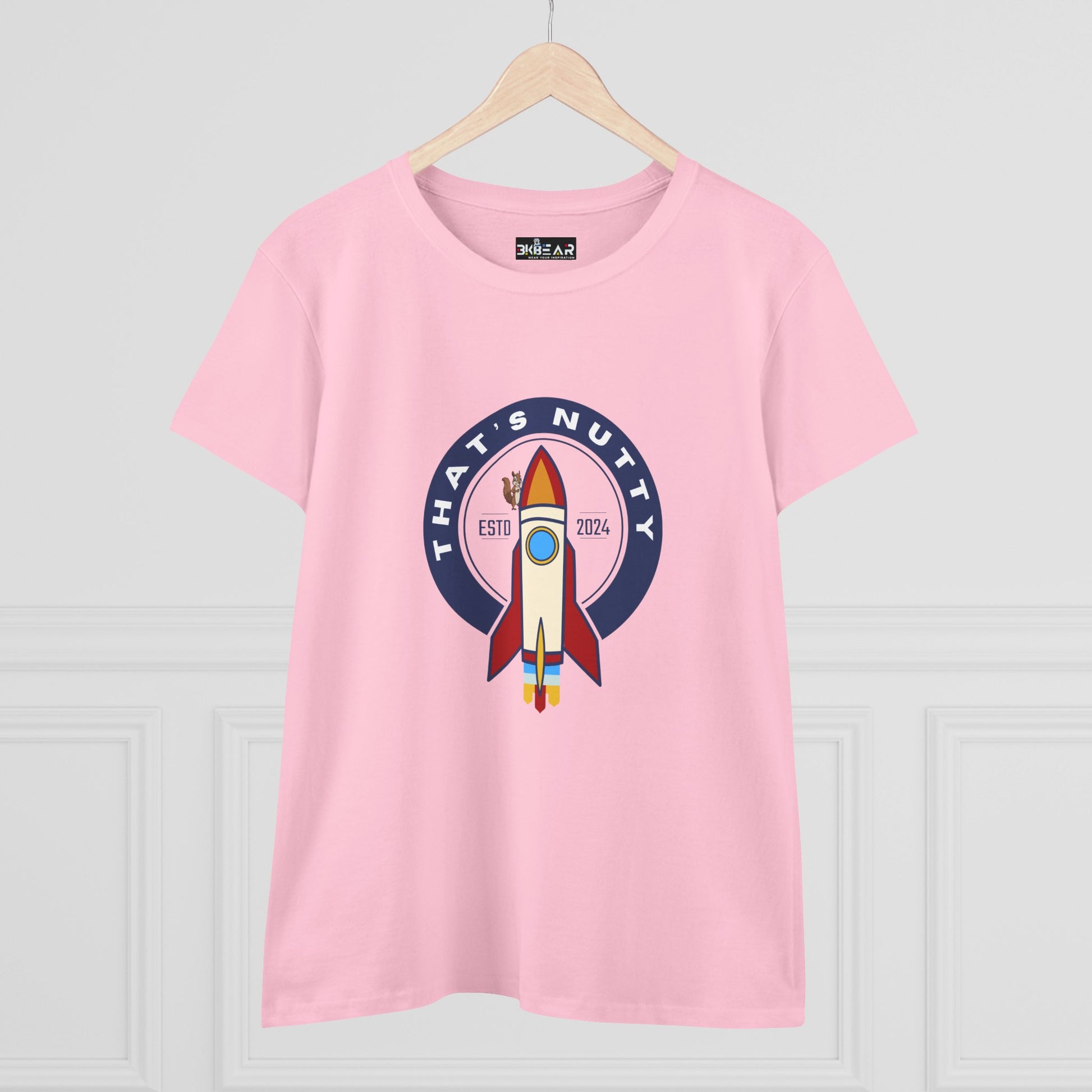 Pink Printify t-shirt featuring a funny space graphic shirt design with a rocket and text on front