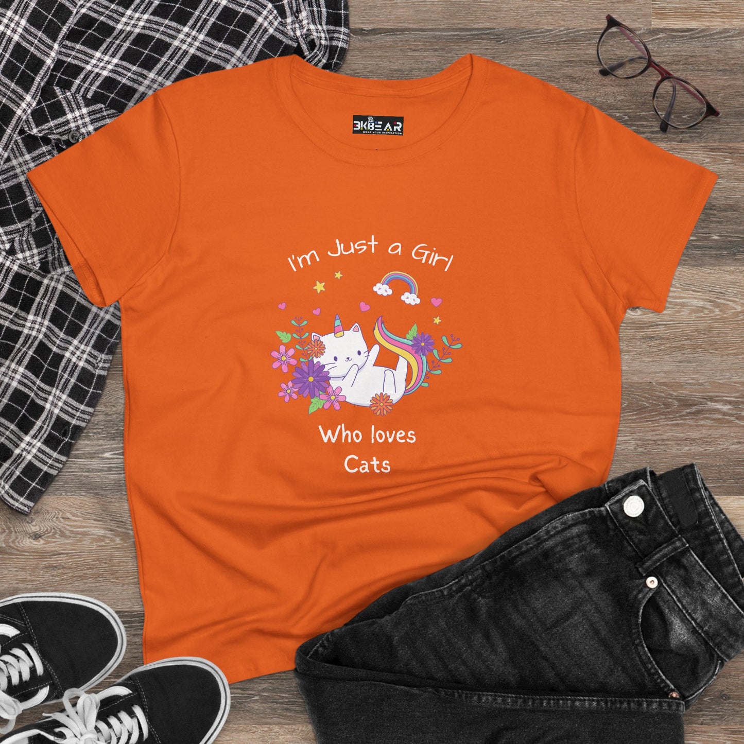 Orange girl who loves cats t-shirt featuring a white cat with flowers and rainbow design