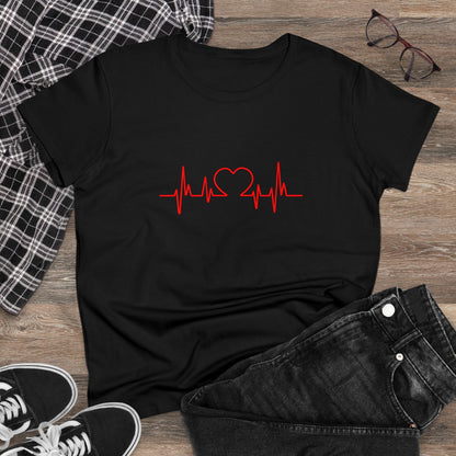 Black heartbeat graphic t-shirt with red heart and pulse line design laid flat with jeans and sneakers