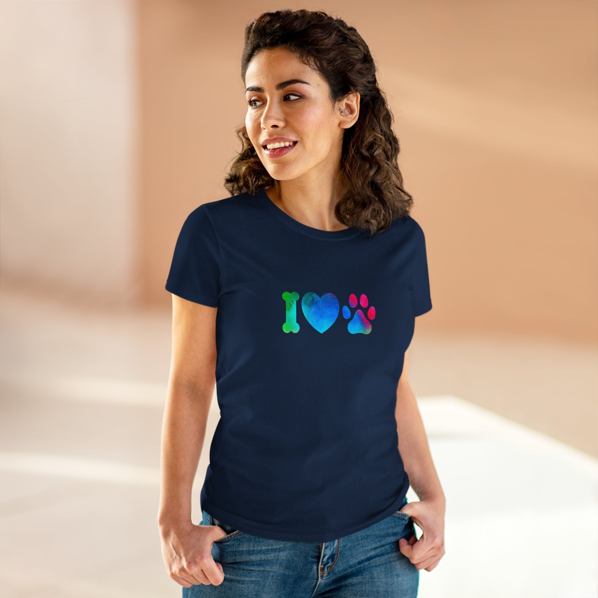 Woman wearing navy blue I heart paws shirt with colorful bone heart and paw print design