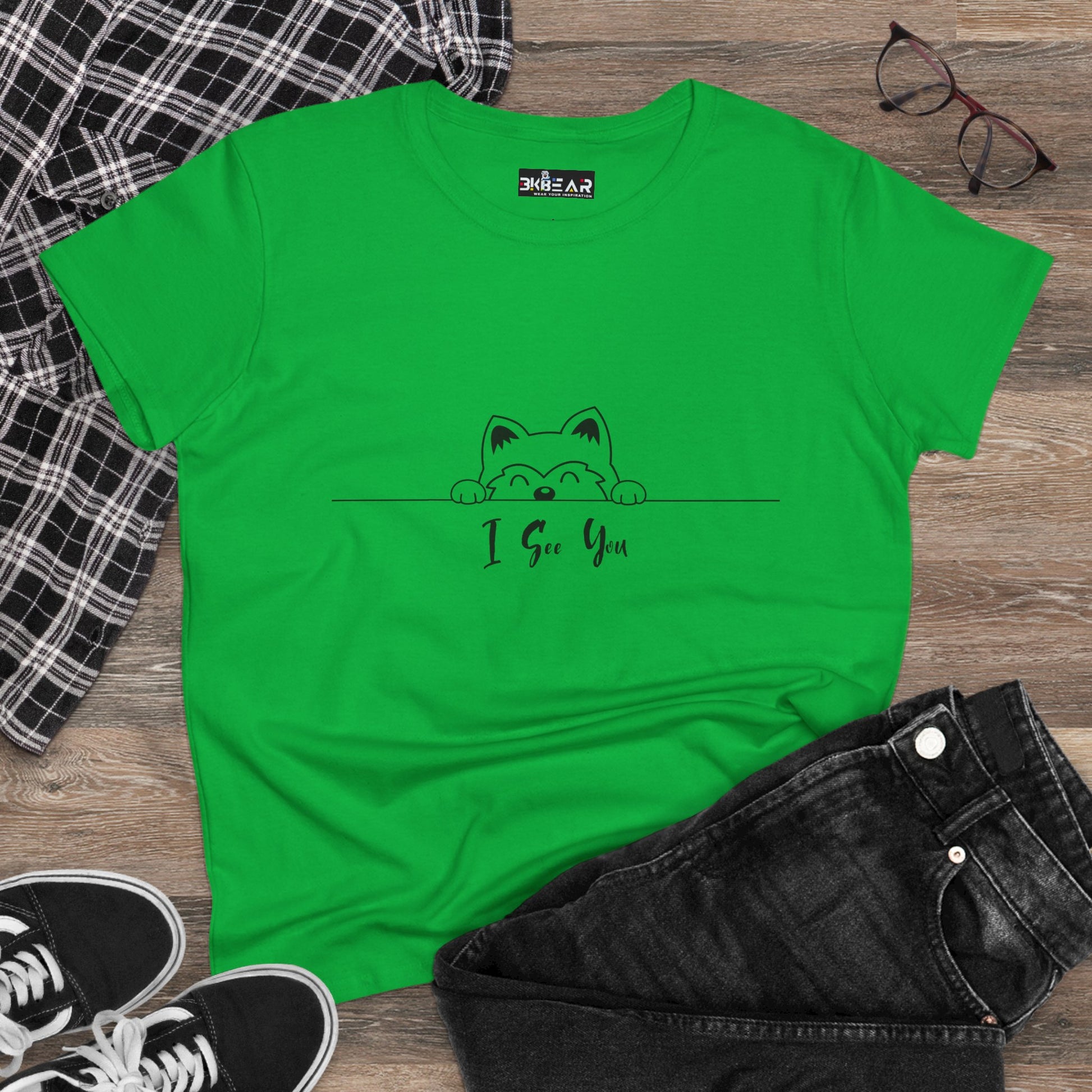 Green I See You Shirt with cute cat graphic paired with black jeans and sneakers from Printify