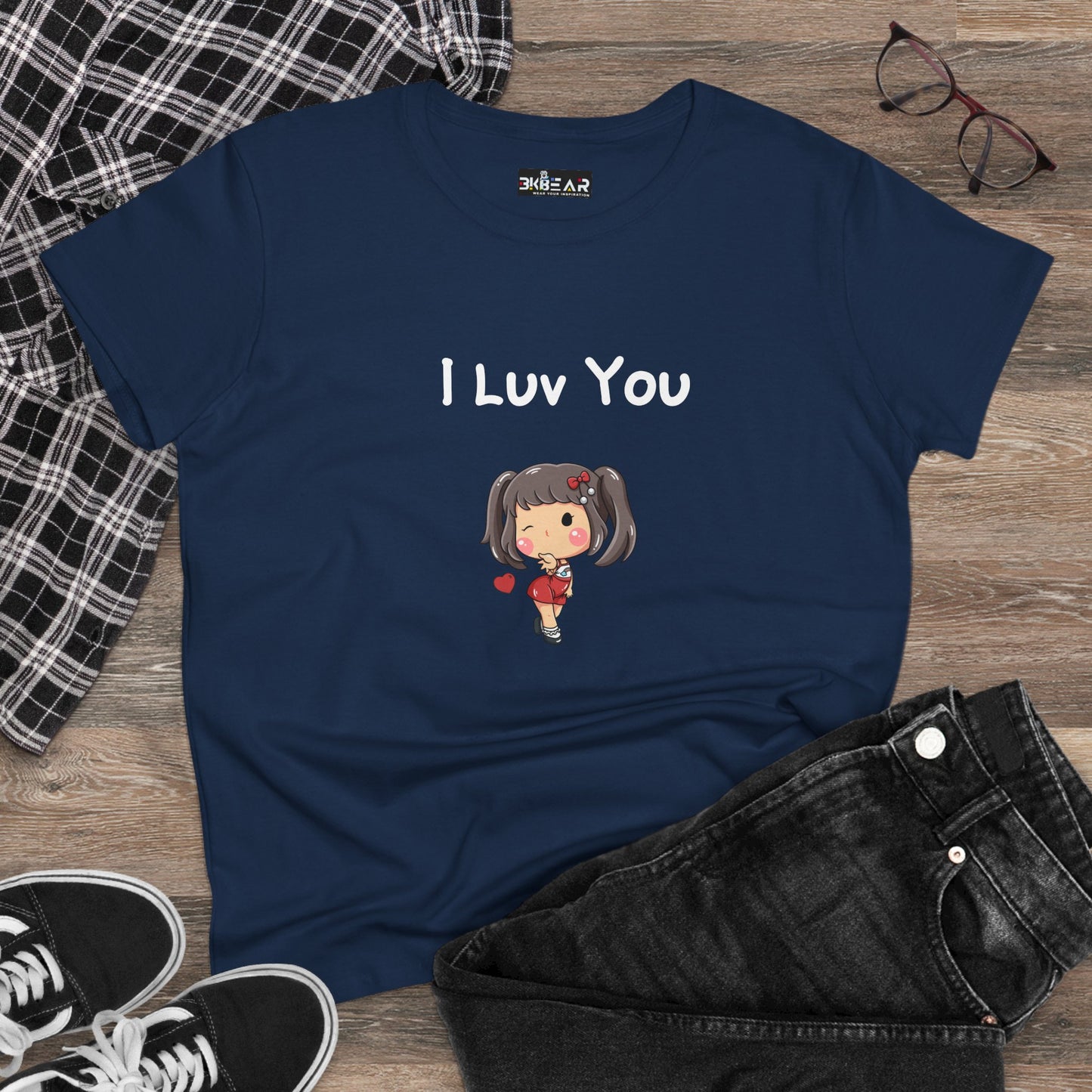 Navy blue I luv you t-shirt with cute girl graphic by Printify laid with black jeans shoes and glasses