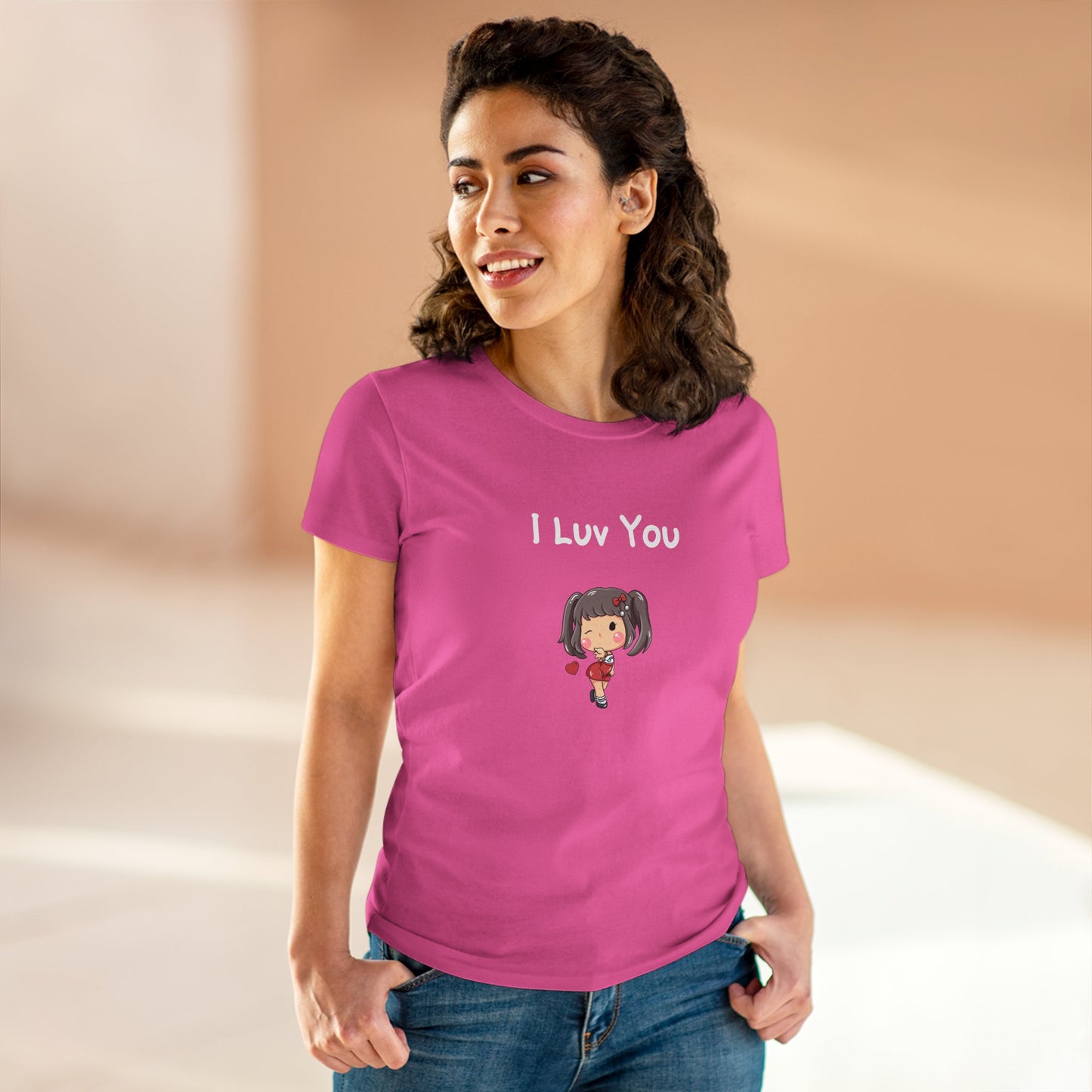 Woman wearing a pink I luv you t-shirt with a cute cartoon girl holding a heart design