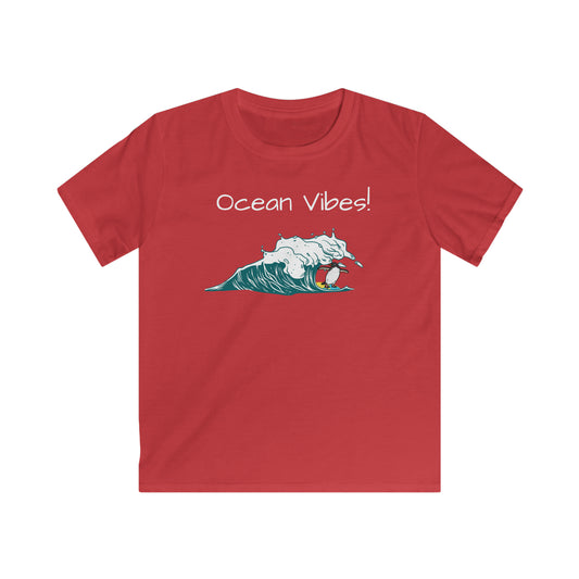 Red kids ocean vibes t-shirt with surfing wave graphic and Ocean Vibes text from Printify