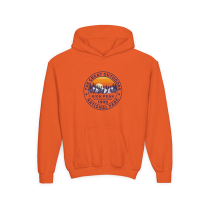 Orange kids outdoor sweatshirt with mountain graphic and front pocket by Printify