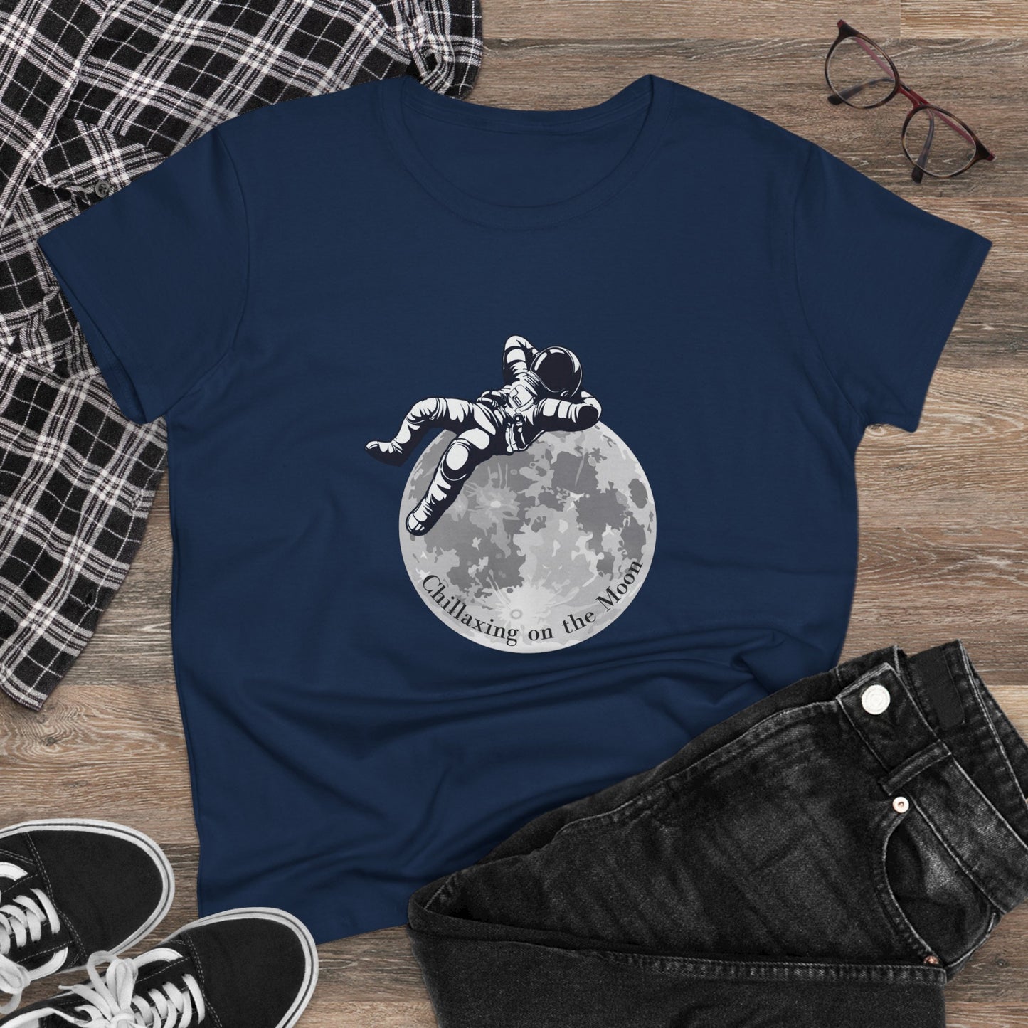 Navy moon t-shirt women with astronaut lounging on moon graphic and Chillaxing text