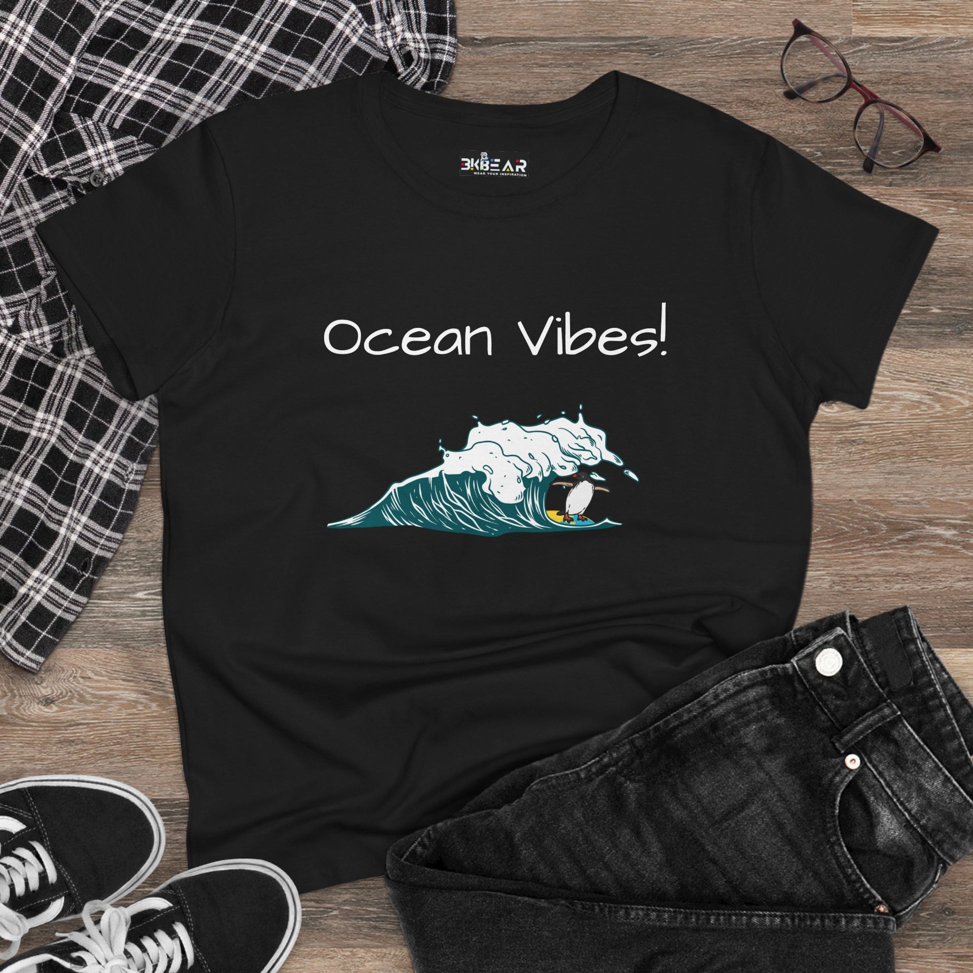 Black beach graphic tee with ocean wave and surfboard design and Ocean Vibes text
