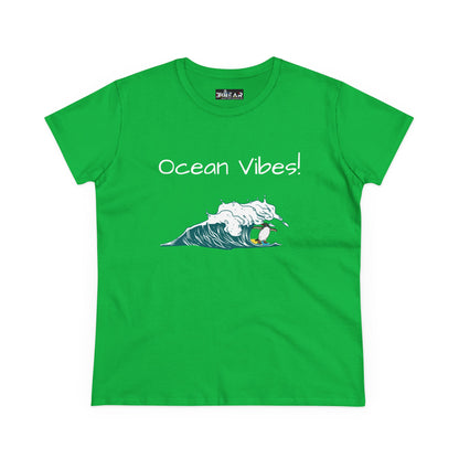 Green Printify T-shirt with ocean vibes text and surfing wave design beach graphic tee