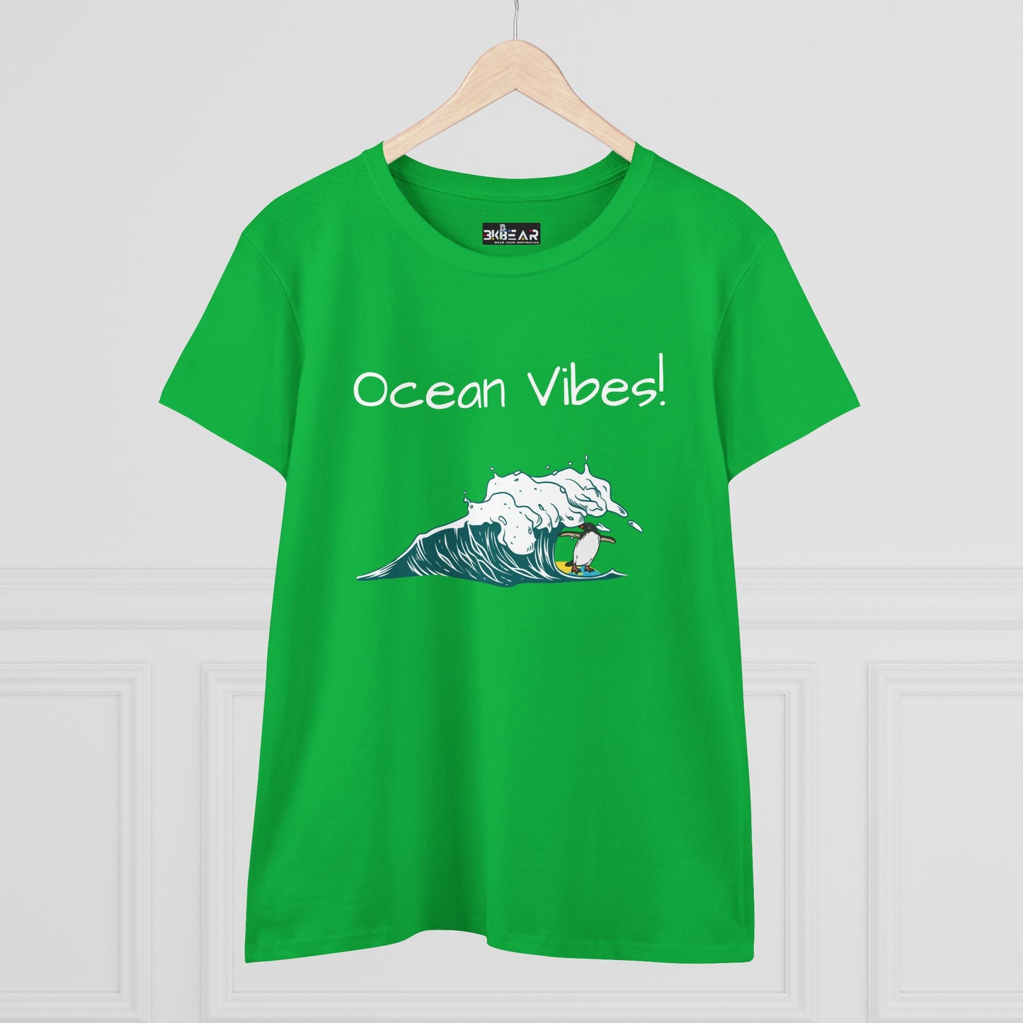 Green Printify t-shirt with Ocean Vibes text and surfing wave graphic beach graphic tee