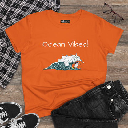 Orange beach graphic tee with ocean vibes text and wave surfer design by Printify