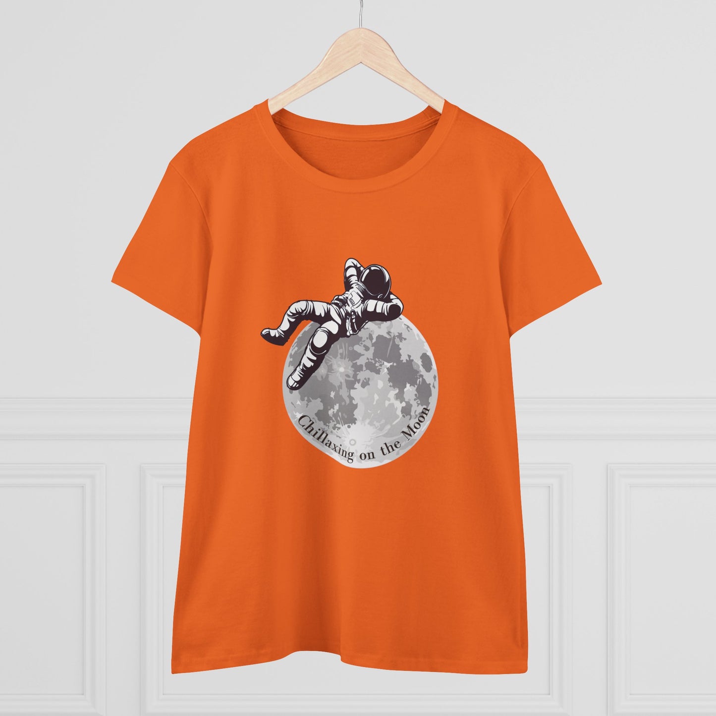 Orange moon t-shirt women with astronaut relaxing on moon graphic by Printify