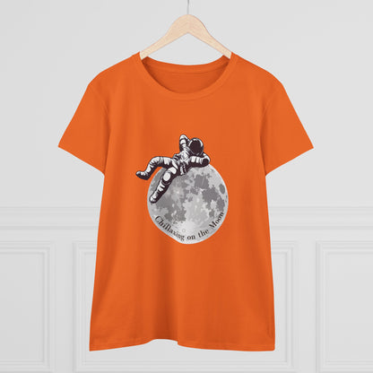 Orange moon t-shirt women with astronaut relaxing on moon graphic by Printify