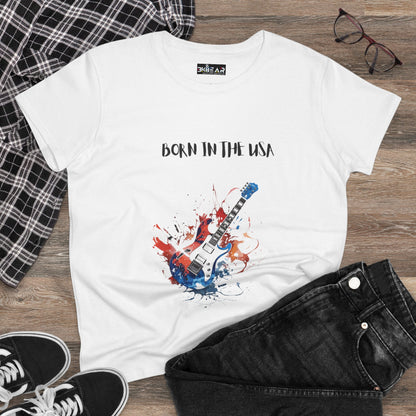 White patriotic guitar tee with Born in the USA text and guitar graphic on wooden background