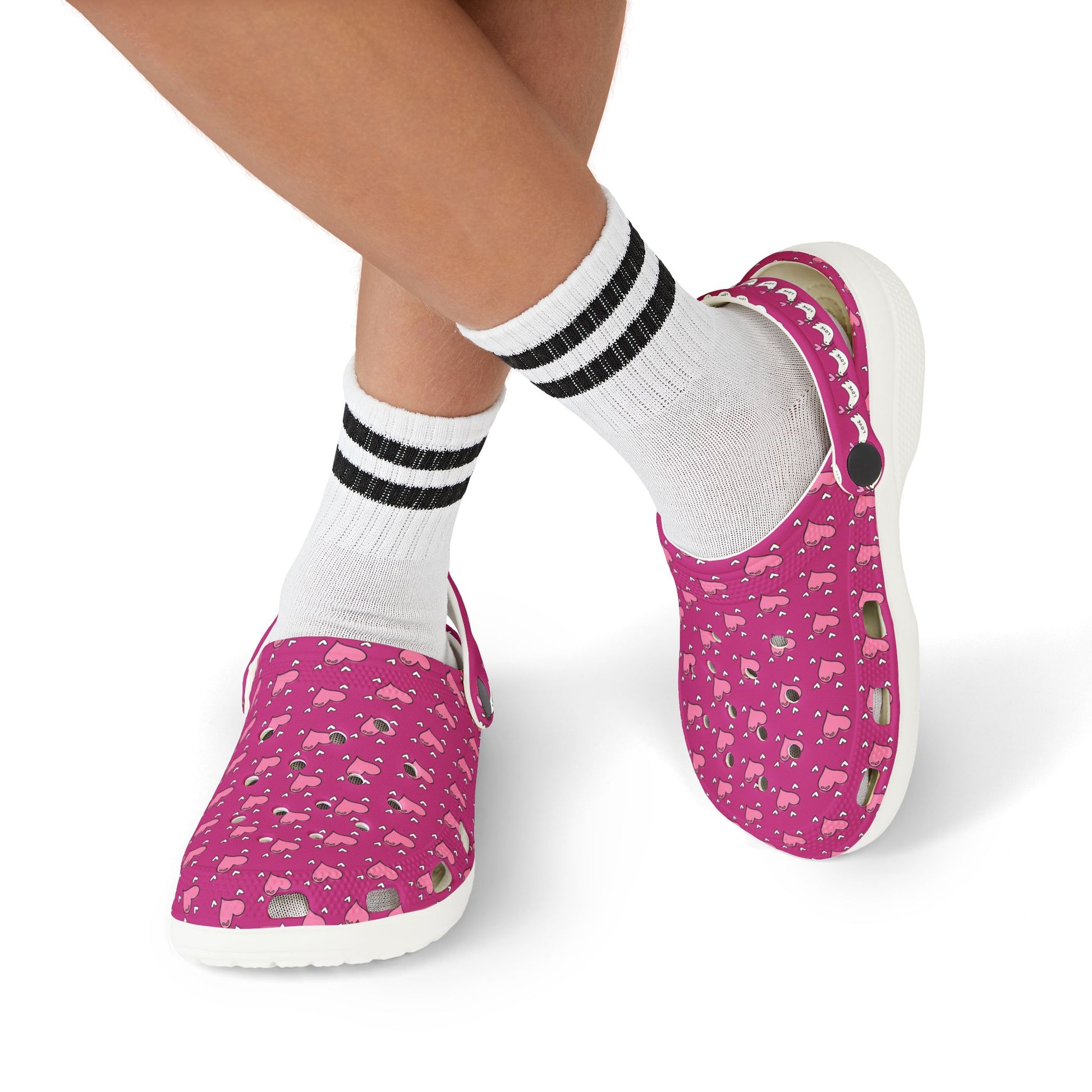 Printify pink rubber clogs with small dog pattern worn with white socks with black stripes