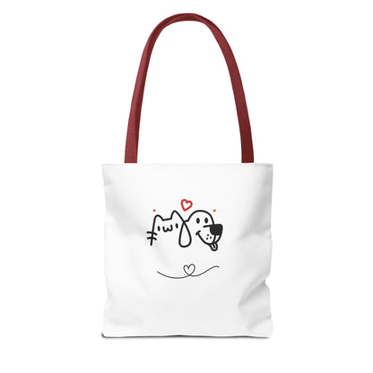 White tote bag with red handles featuring cute puppy love graphic tote design with dog and cat illustration