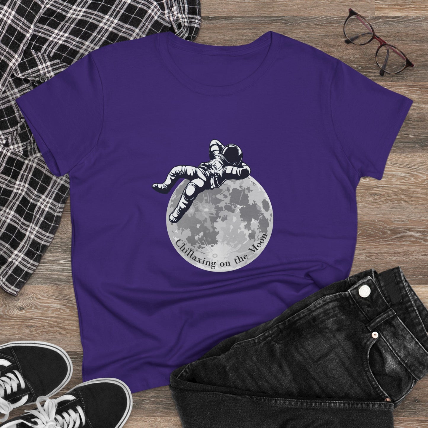 Purple Printify moon t-shirt women with astronaut resting on moon graphic and casual outfit