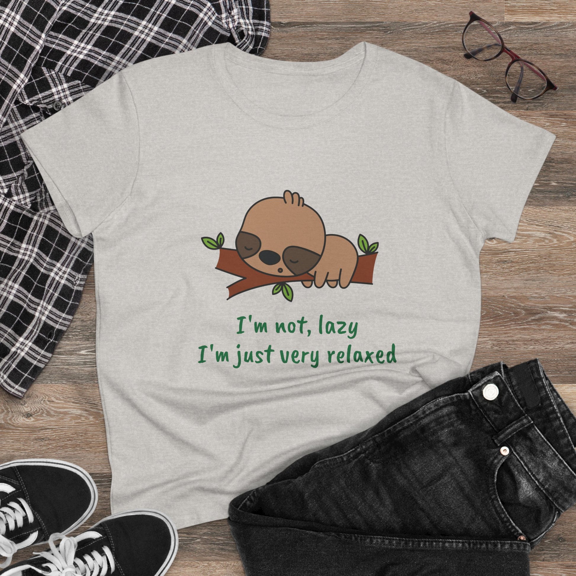 Printify relaxed sloth t-shirt for women with cute sleeping sloth on branch and green text design