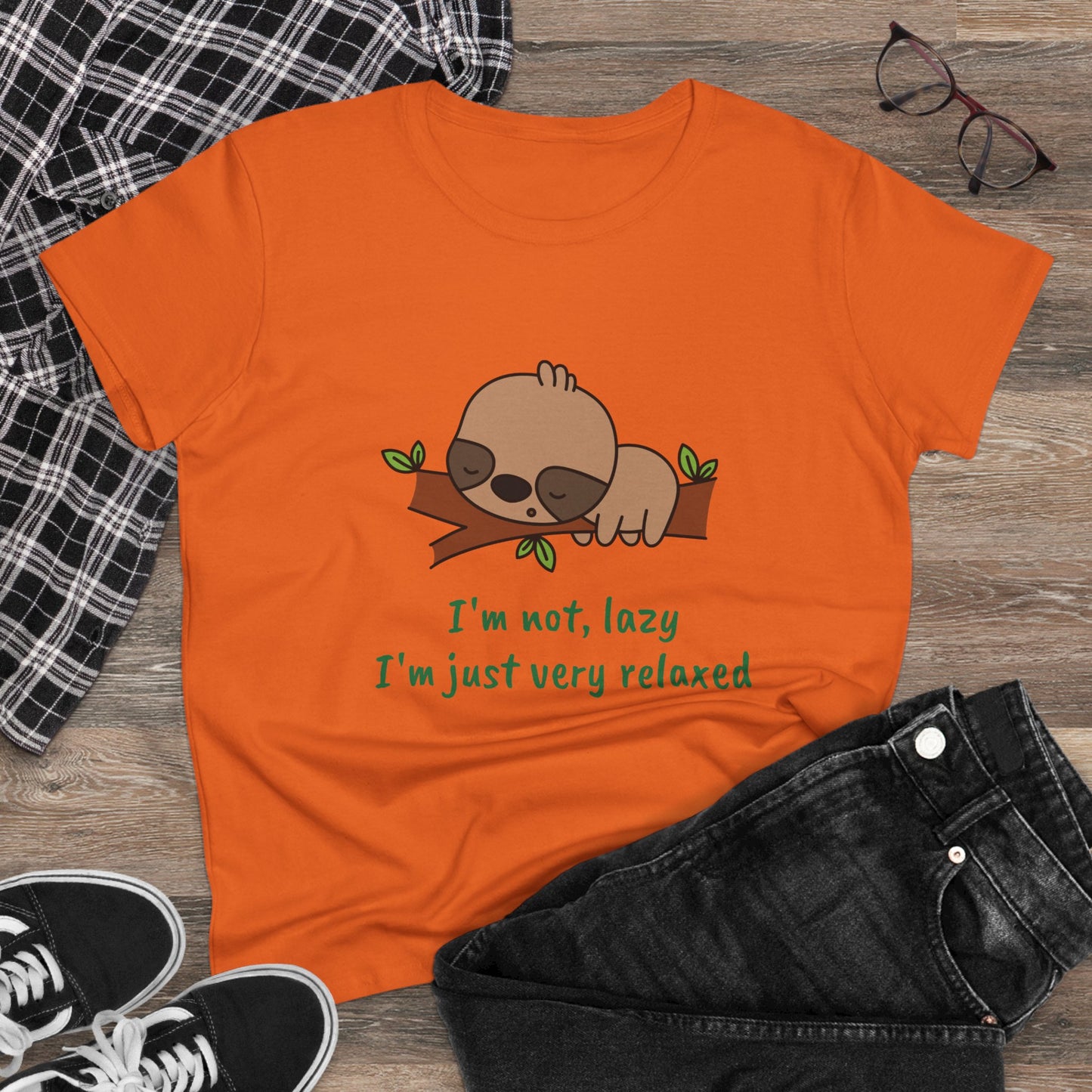 Orange relaxed sloth t-shirt for women with cute sleeping sloth graphic and text on front