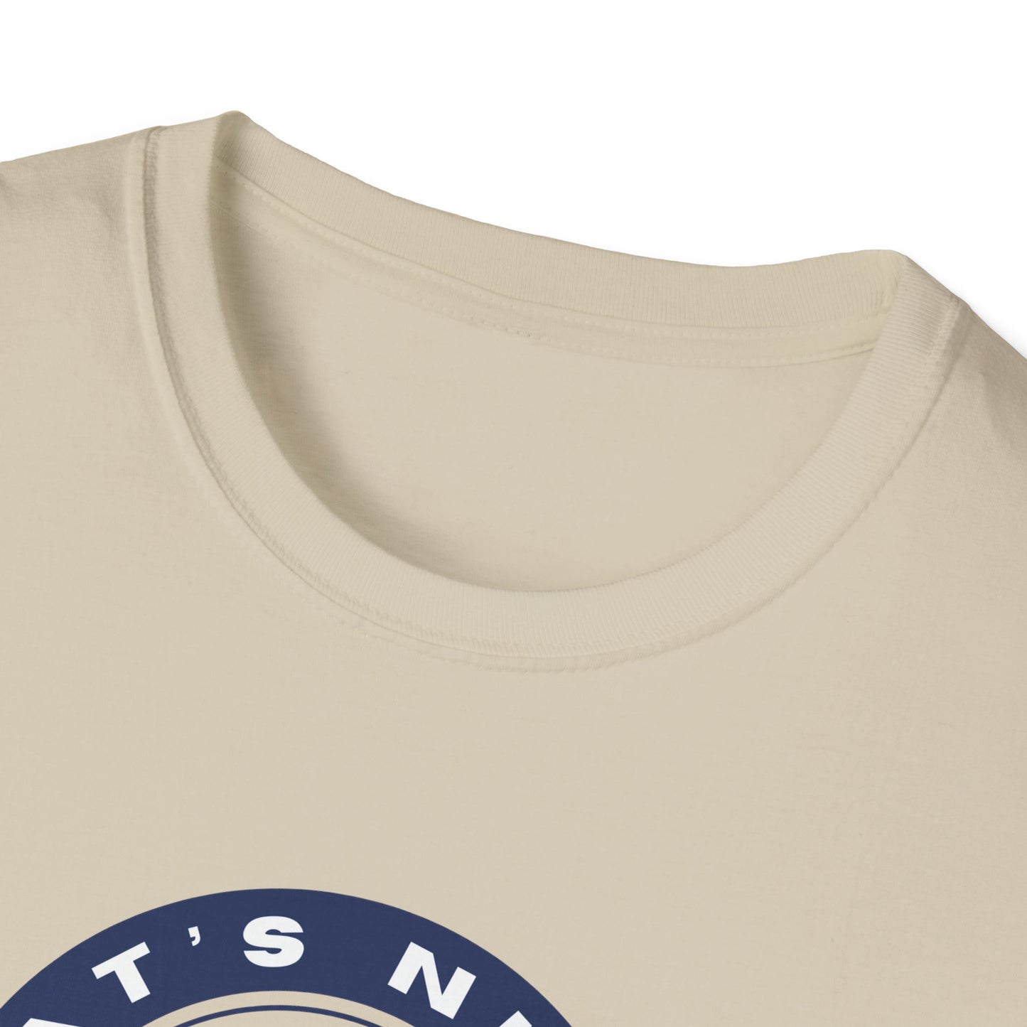 Close-up of beige Printify rocket ship tee showing round neckline and partial graphic design