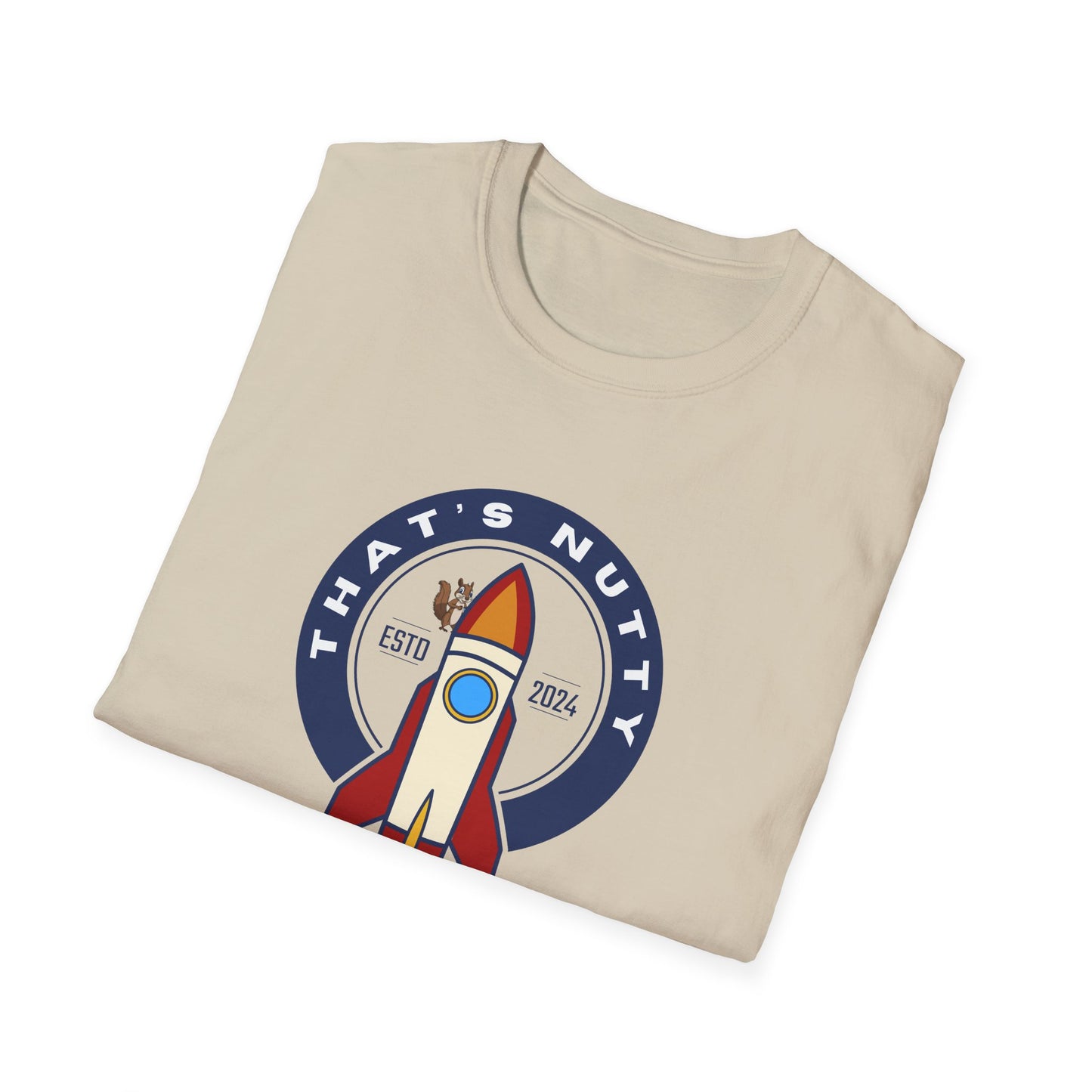 Beige Printify t-shirt with colorful rocket ship tee graphic and text that's nutty