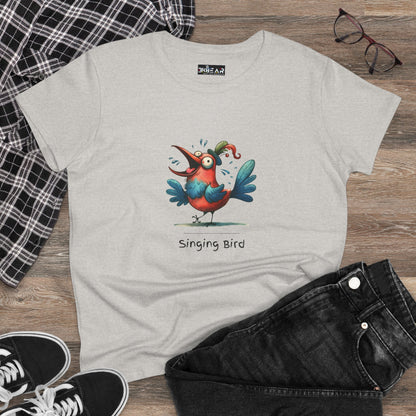 Light gray Printify singing bird shirt with colorful cartoon bird graphic and casual outfit on wooden floor