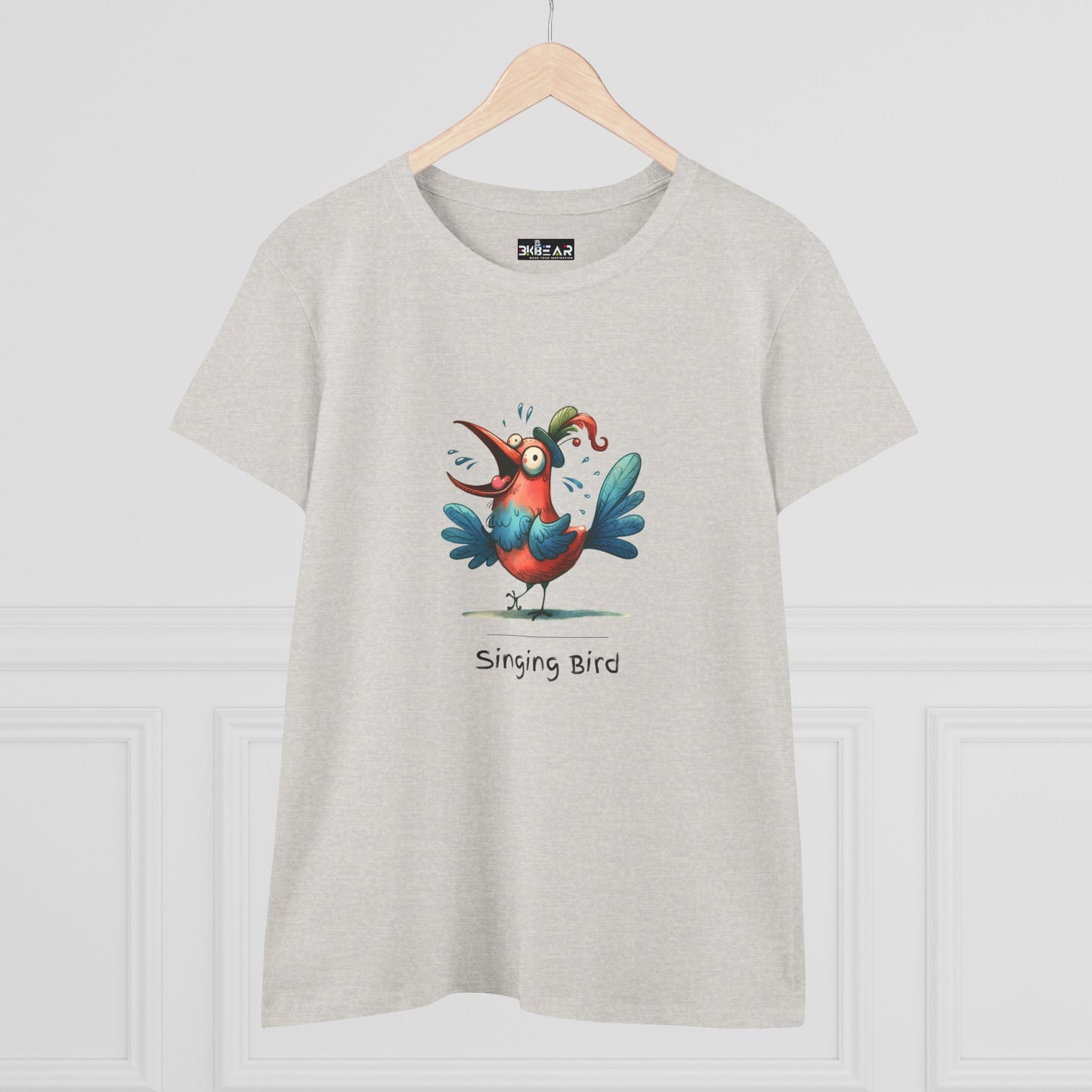 Light gray Printify T-shirt with colorful cartoon singing bird design and singing bird shirt text