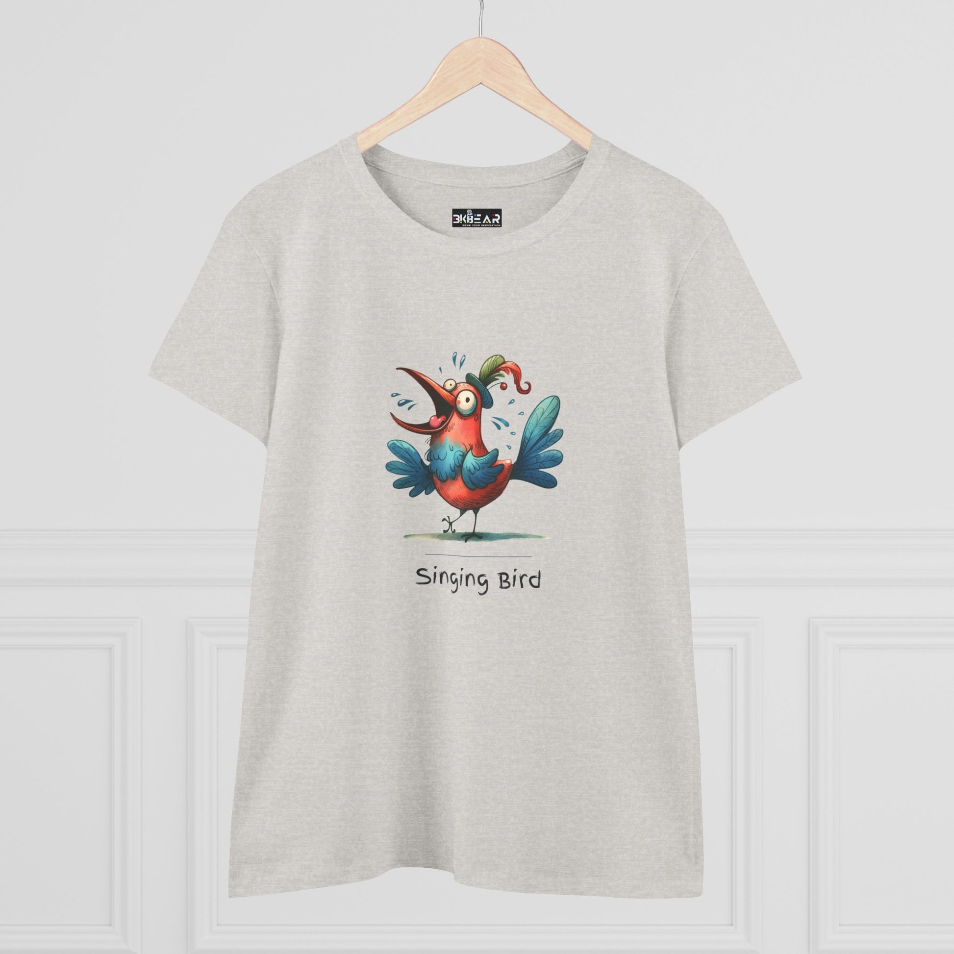 Light gray Printify T-shirt with colorful cartoon singing bird design and singing bird shirt text