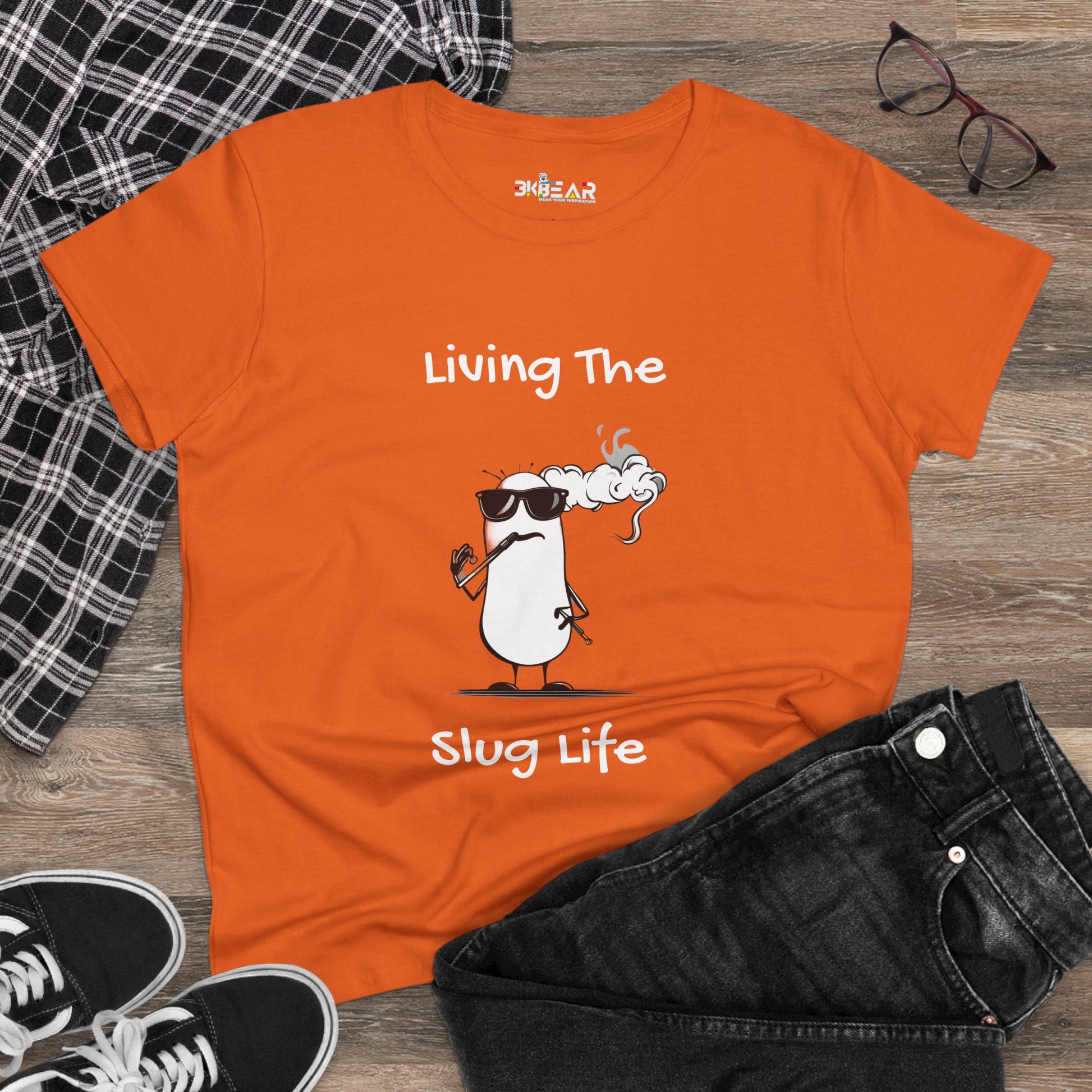 Orange Printify t-shirt with cool slug character and Living The Slug Life slogan slug life shirt