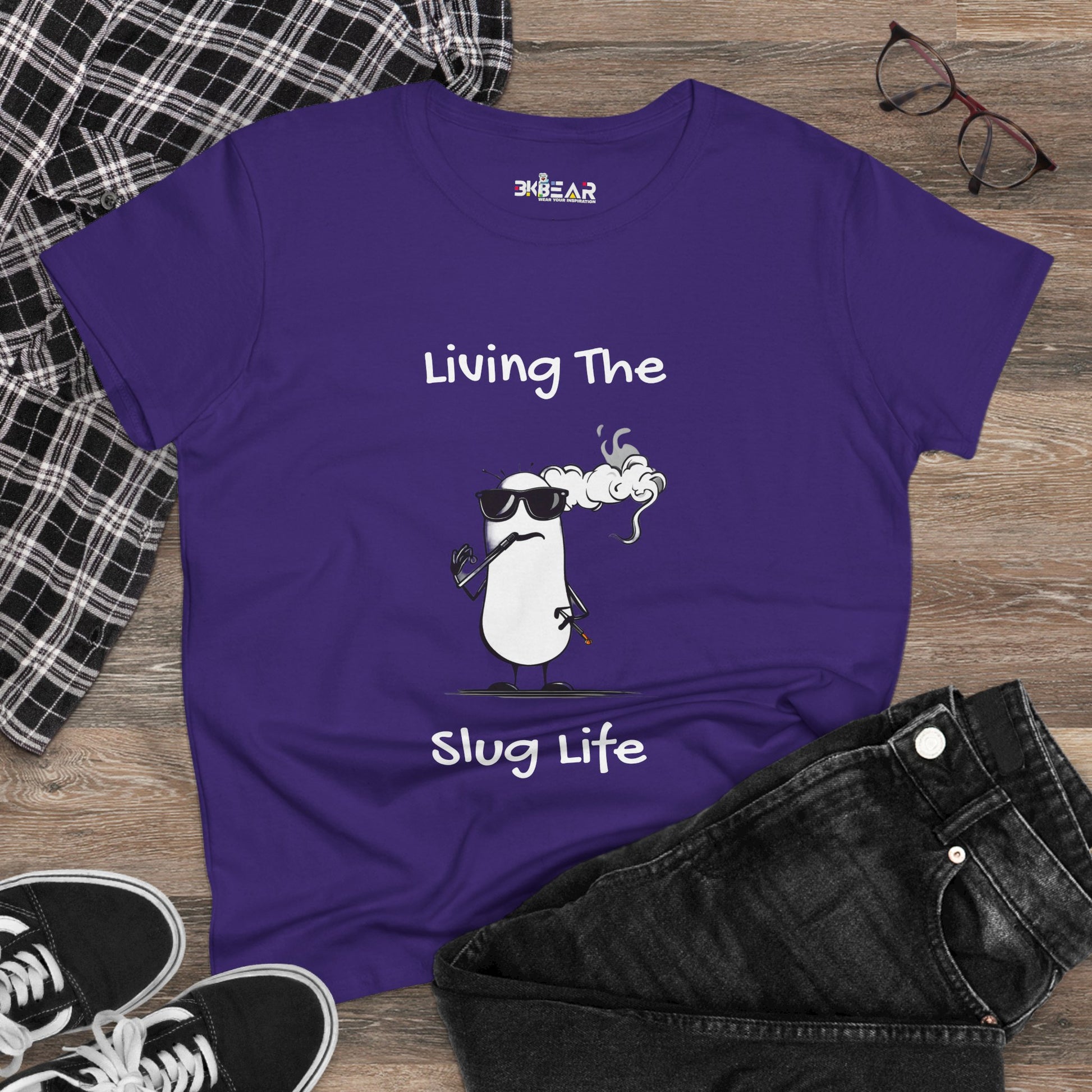Purple slug life shirt with a cool cartoon slug wearing sunglasses and smoking on a wooden background