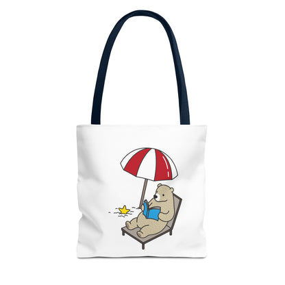 summer tote with bear design featuring a bear reading under a red and white umbrella