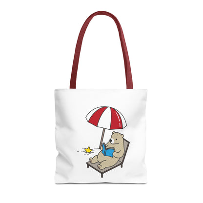 Printify summer beach tote with bear design featuring a bear reading under a striped umbrella