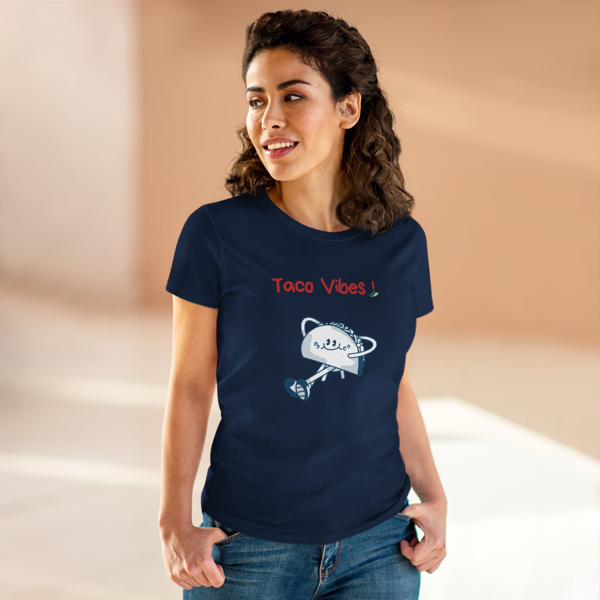 Woman wearing navy taco graphic tee with cartoon taco and text Taco Vibes from Printify
