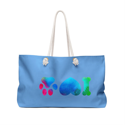 Blue Printify cute animal print weekender bag with paw, heart, and bone design and white rope handles