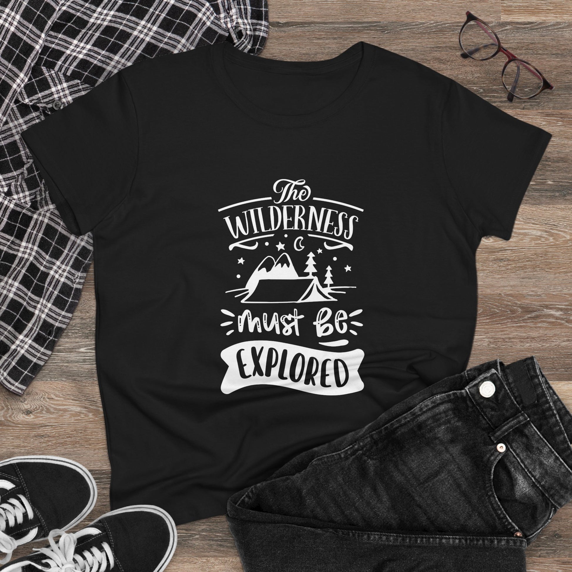 Black Printify t-shirt with white wilderness exploration shirt graphic featuring mountains and trees