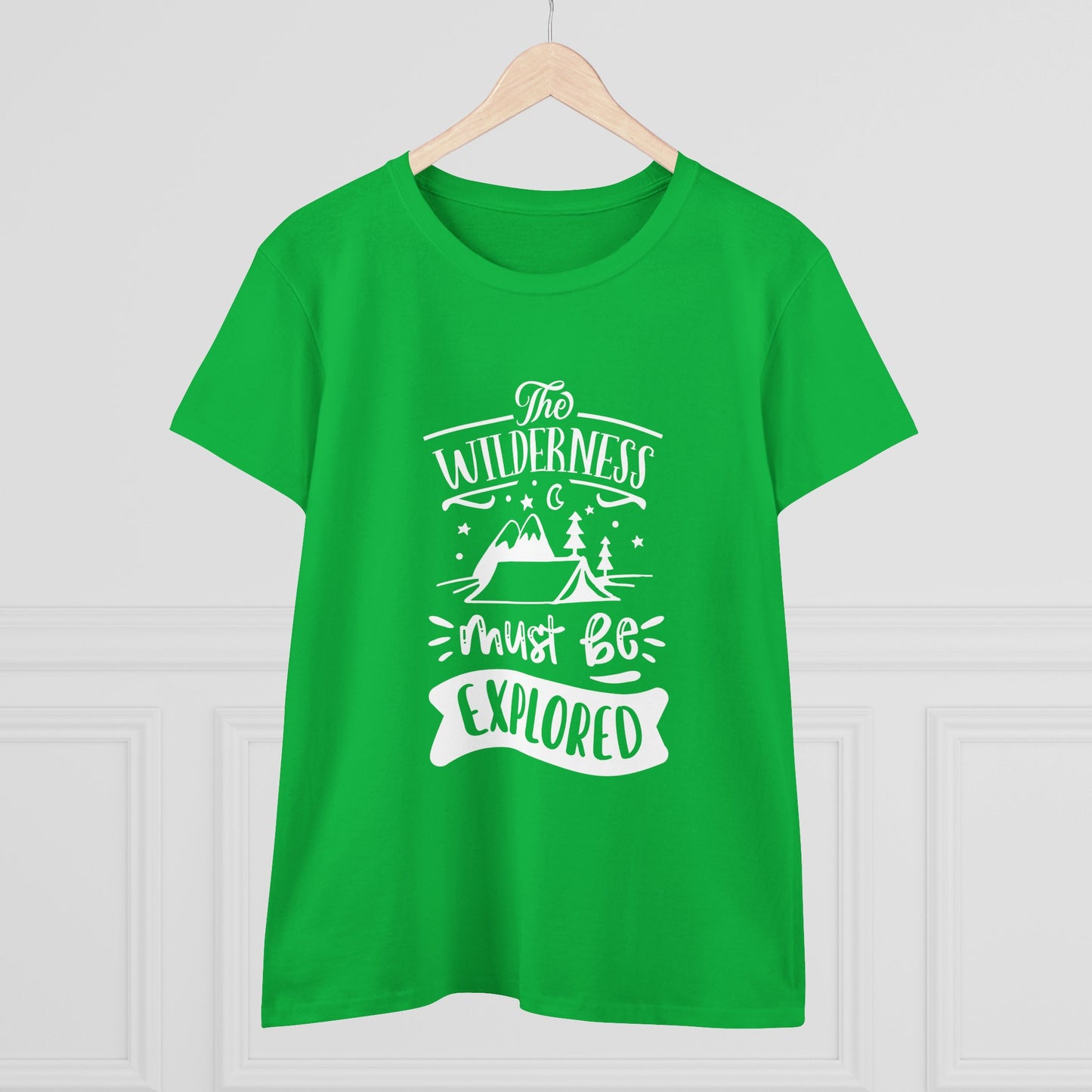 Green Printify T-shirt with white wilderness exploration shirt design featuring mountains and trees