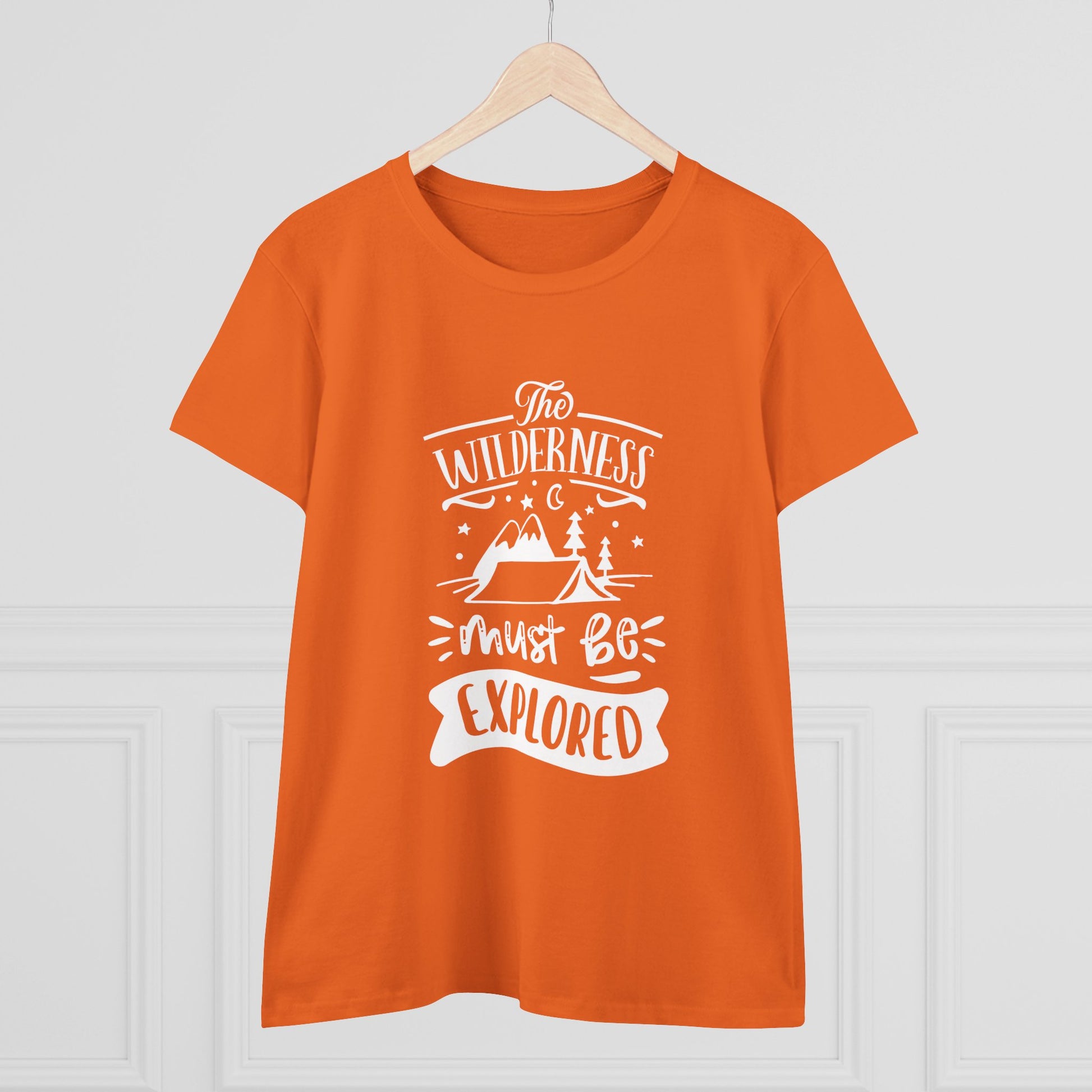 Orange Printify T-shirt with white wilderness exploration shirt design featuring mountains and trees