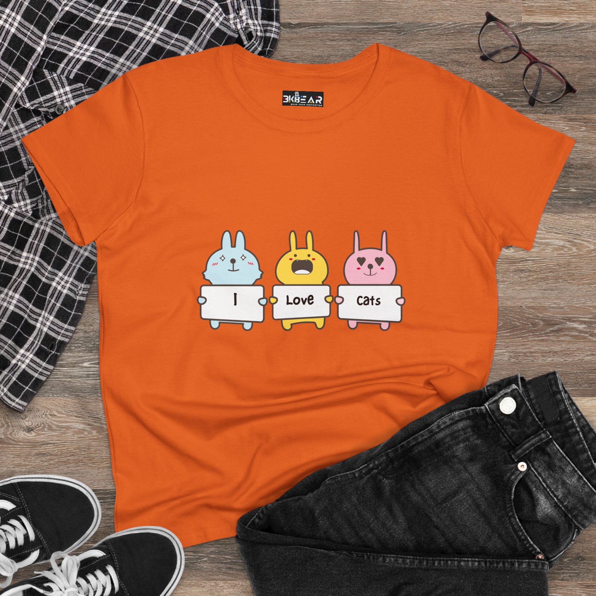 Orange women's cat lover t-shirt with cute cartoon cats holding I love cats signs printed on front